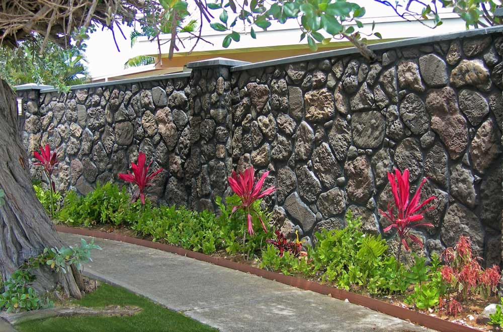 residential privacy wall with stone pattern